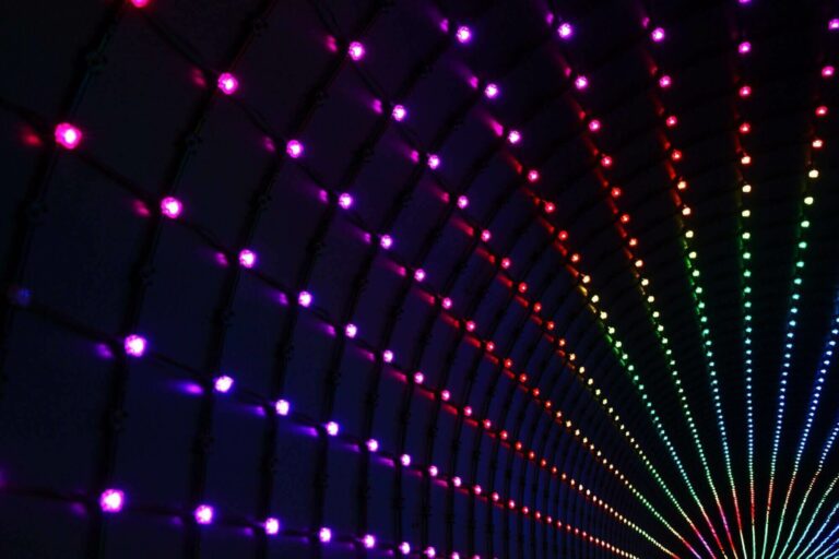 Tons of multi colored lights in a tunnel