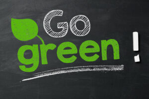 Go green lettering on a chalkboard